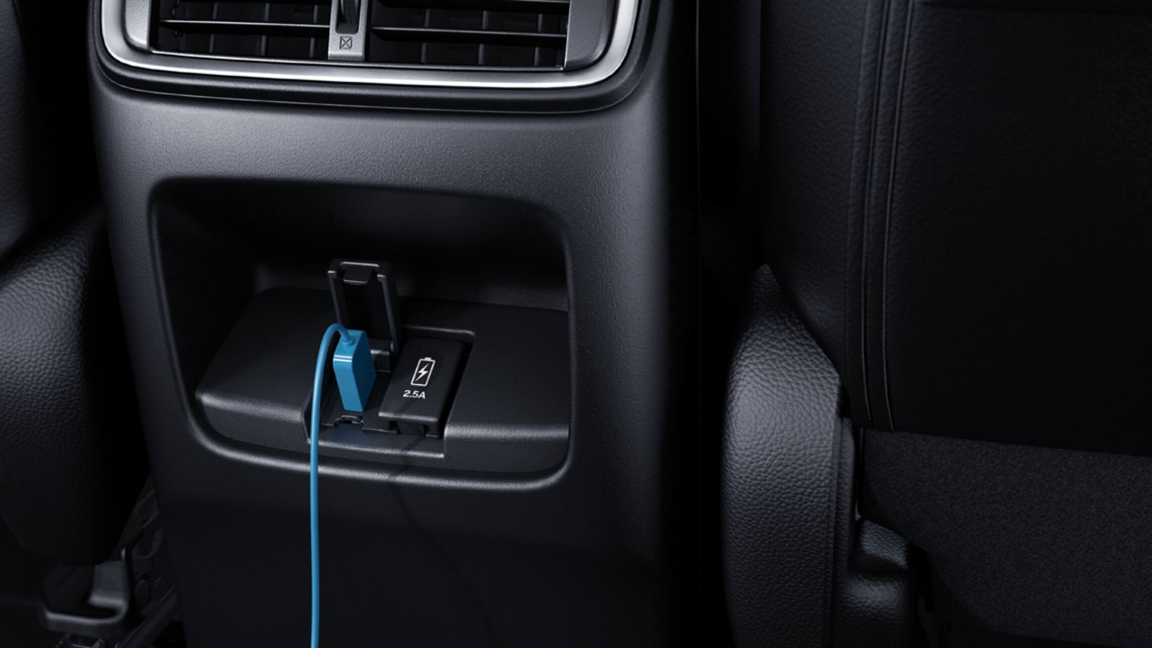 Interior view of rear USB ports in the 2019 Honda CR-V.
