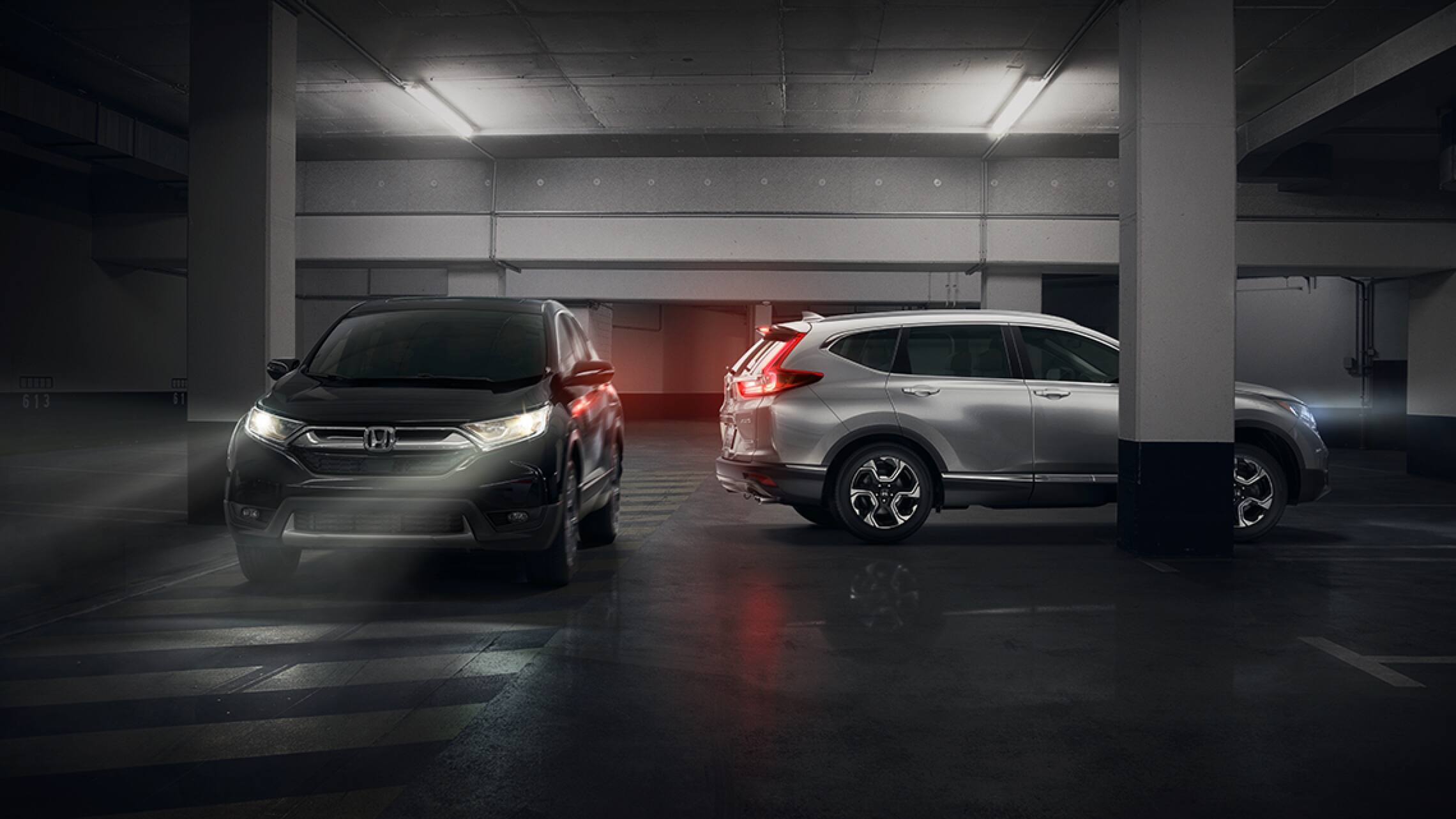 2019 Honda CR-V Touring demonstrating available cross traffic monitor.